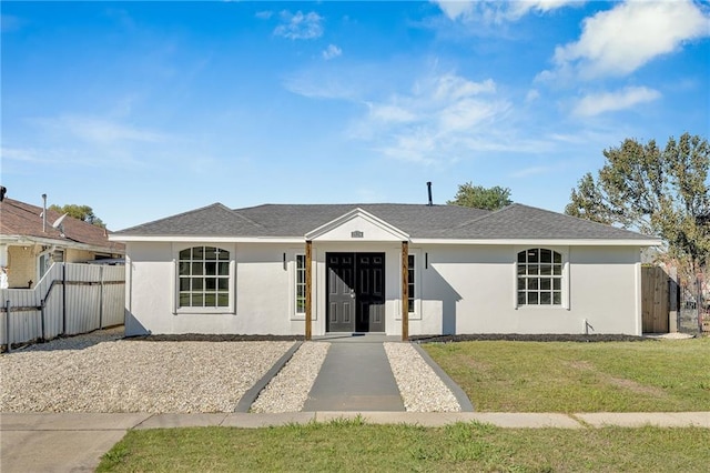 ranch-style house with a front yard