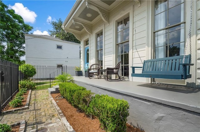 exterior space featuring covered porch