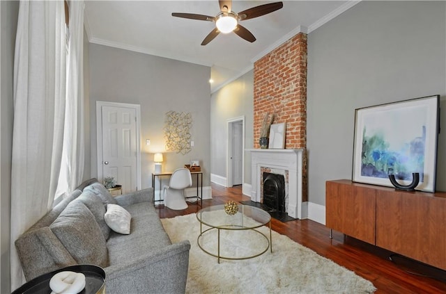 living room with a fireplace, ornamental molding, and dark wood-type flooring