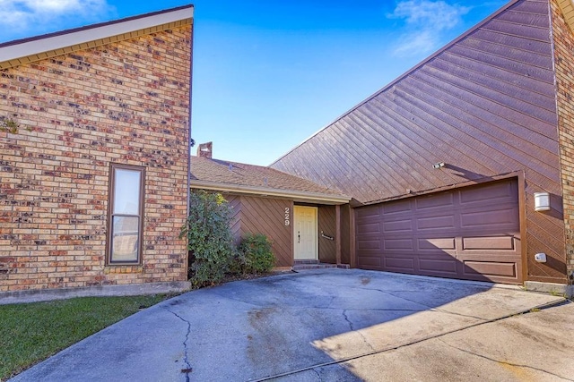 view of front of property featuring a garage