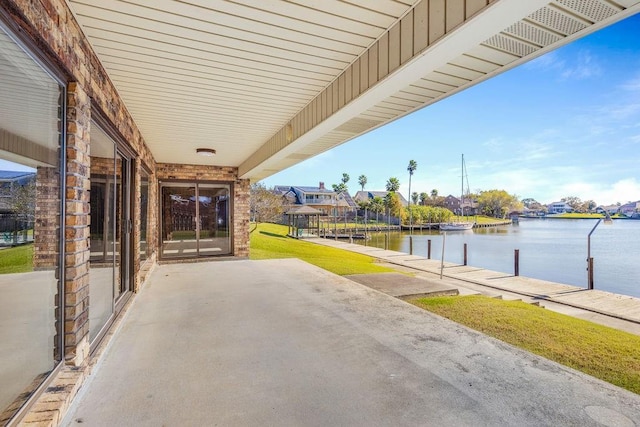 view of patio / terrace with a water view