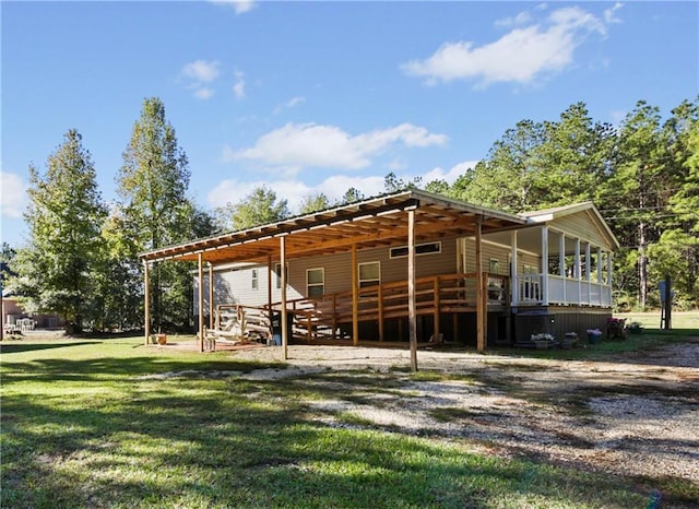 rear view of house with a deck