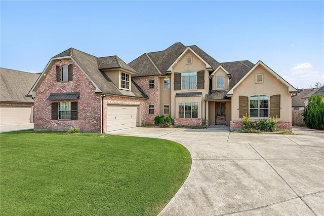 view of front facade featuring a front yard and a garage