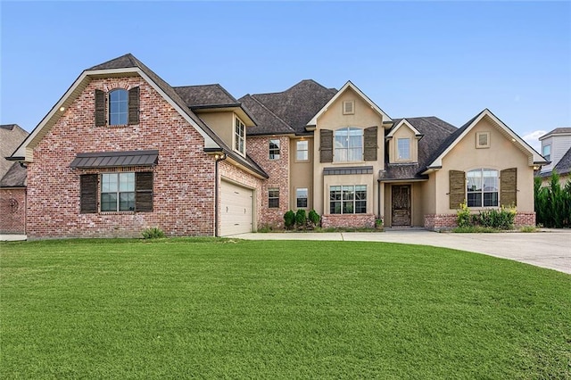 view of front of property with a front yard and a garage