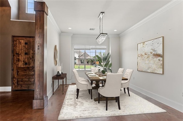 dining space featuring ornamental molding