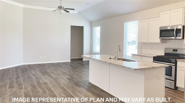 471 E Lakeshore Vlg, Slidell, LA 70461 - kitchen featuring appliances with stainless steel finishes, a kitchen island with sink, vaulted ceiling, white cabinets, and ceiling fan