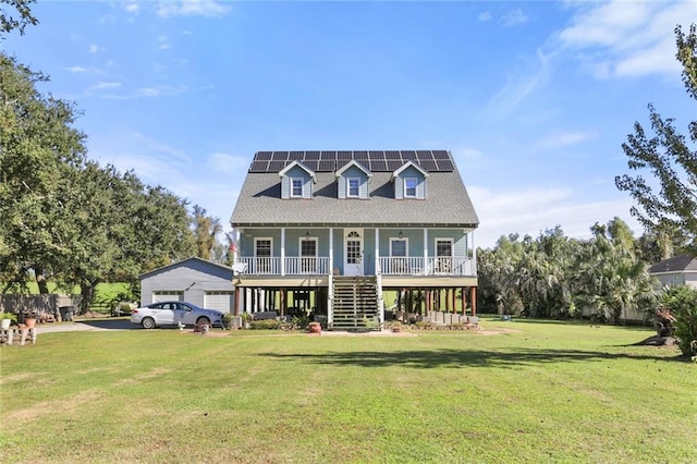 view of front of property with a porch and a front yard