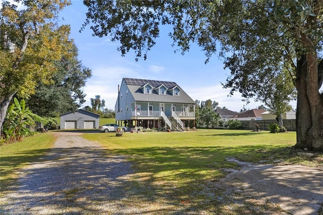 view of front of house featuring covered porch and a front lawn