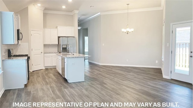 kitchen with pendant lighting, white cabinets, ornamental molding, and appliances with stainless steel finishes