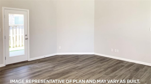 spare room with dark wood-type flooring