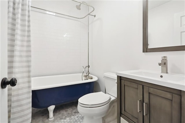 full bathroom featuring tile patterned flooring, vanity, toilet, and shower / tub combo