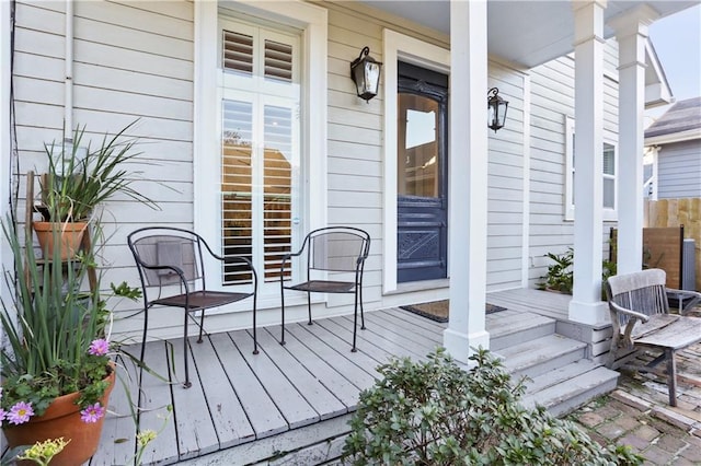 wooden terrace with covered porch