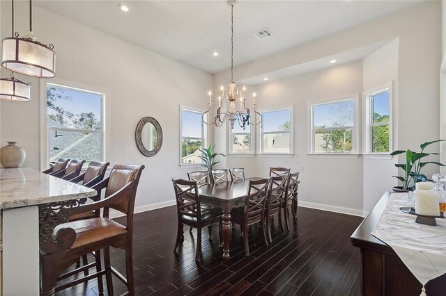 kitchen featuring sink, gas range, stainless steel dishwasher, light stone countertops, and cream cabinetry