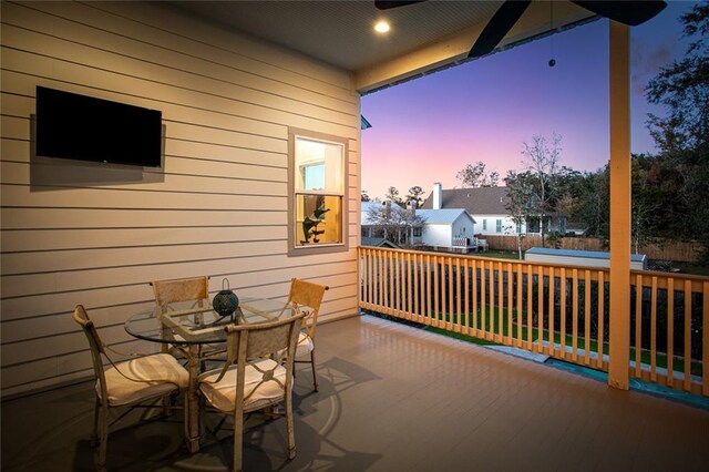 pool at dusk with a pergola