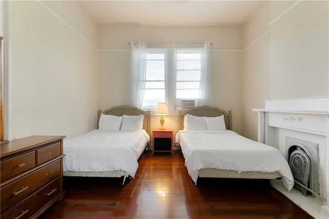 bedroom featuring dark hardwood / wood-style floors