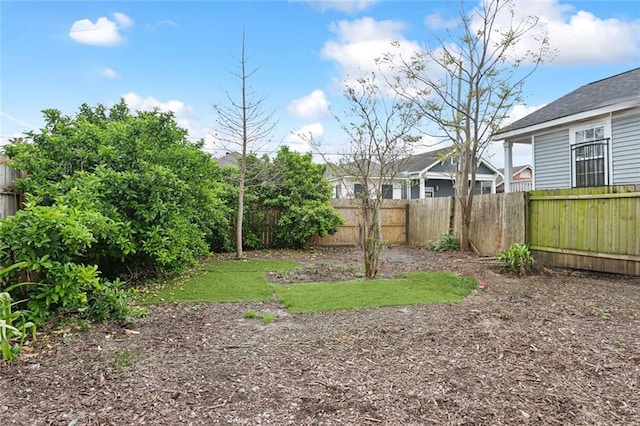 view of yard featuring fence