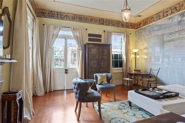 living area with wood-type flooring