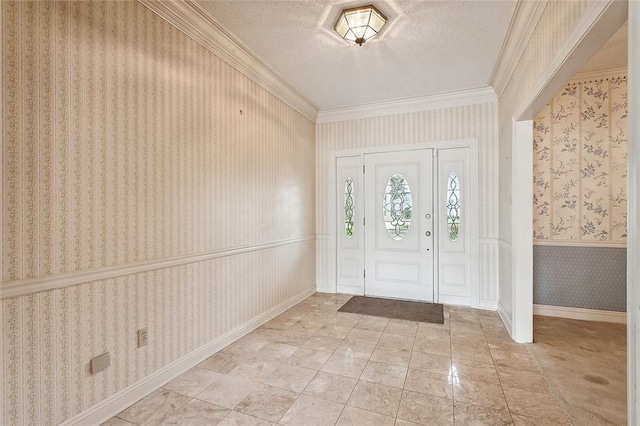 carpeted foyer entrance featuring a textured ceiling and ornamental molding