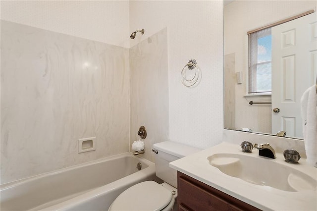 full bathroom featuring vanity,  shower combination, and toilet