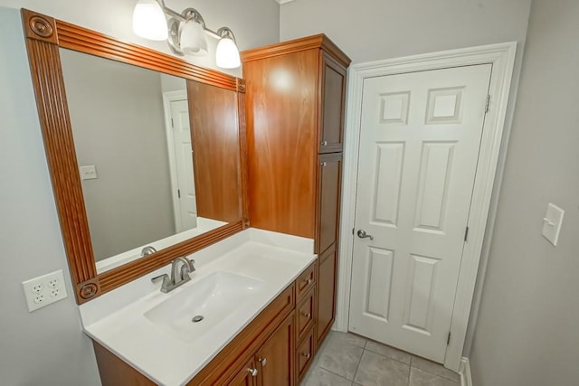 bathroom featuring tile patterned floors and vanity