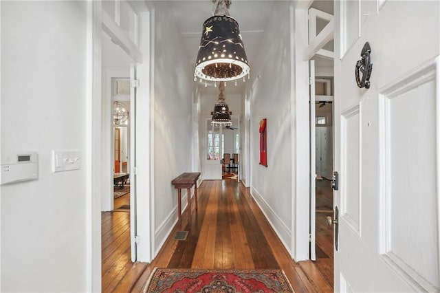 hallway featuring dark hardwood / wood-style floors