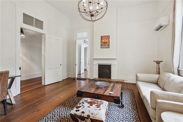 living room with an inviting chandelier, an AC wall unit, and dark wood-type flooring