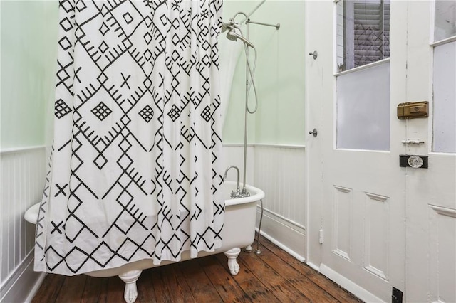 bathroom with hardwood / wood-style flooring