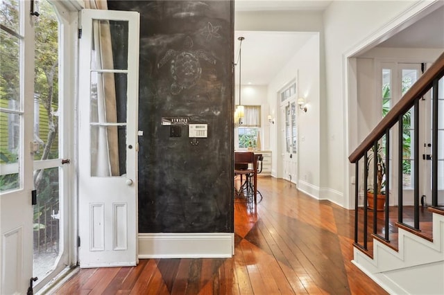 foyer entrance with wood-type flooring