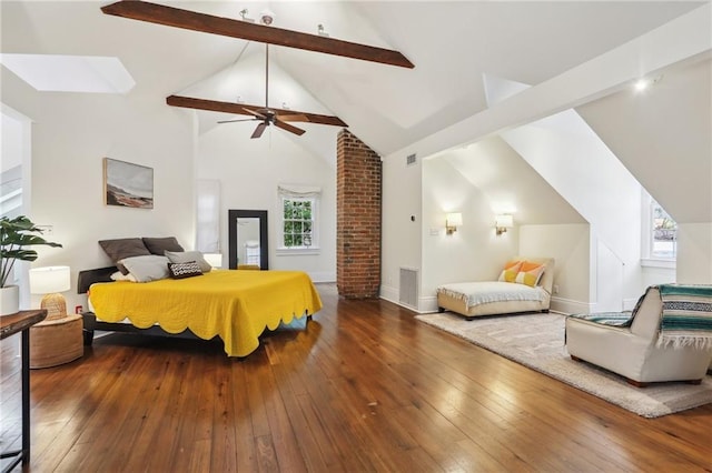 bedroom featuring wood-type flooring, high vaulted ceiling, and beam ceiling