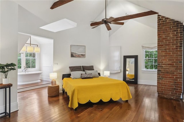 bedroom with ceiling fan, dark hardwood / wood-style flooring, and high vaulted ceiling