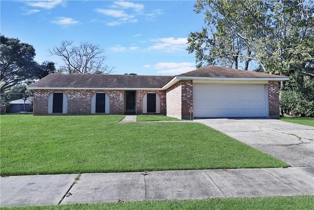 single story home with a garage and a front lawn