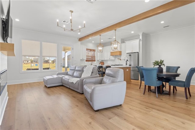 living room featuring beam ceiling, crown molding, a notable chandelier, and light wood-type flooring