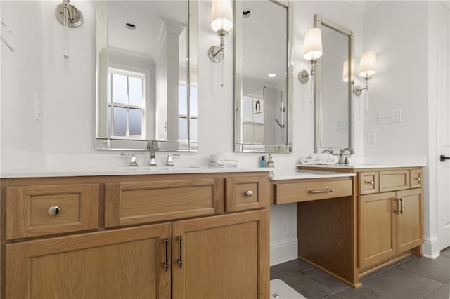 bathroom featuring vanity, ornamental molding, and tile patterned flooring