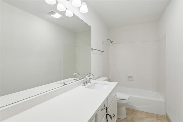 full bathroom featuring tile patterned floors, vanity, toilet, and tub / shower combination