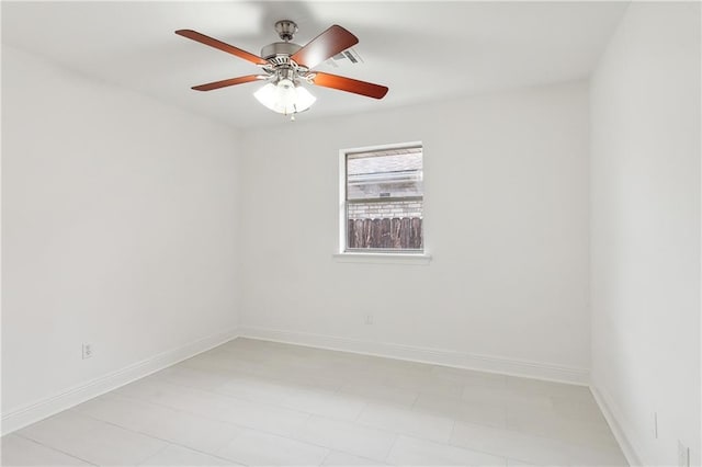 unfurnished room with ceiling fan