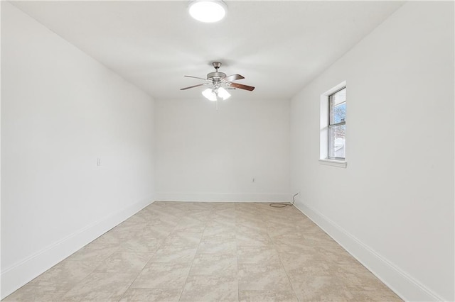 unfurnished room with ceiling fan