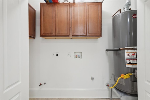 clothes washing area featuring washer hookup, cabinets, gas water heater, hookup for an electric dryer, and light tile patterned floors