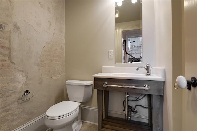 bathroom with sink and toilet