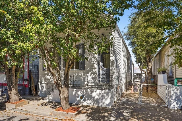 view of property exterior featuring a porch