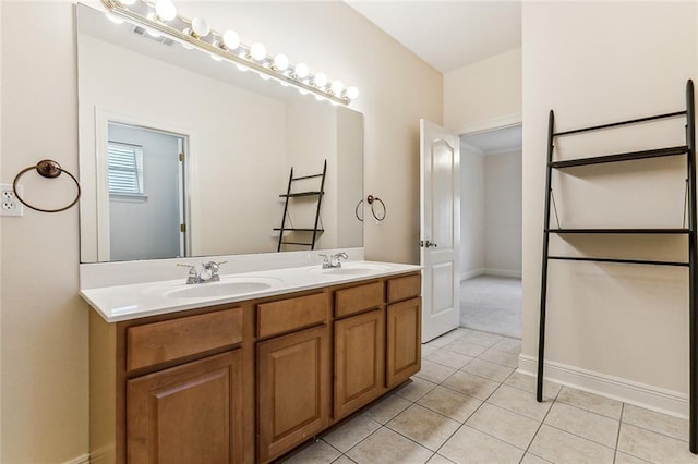 bathroom with vanity and tile patterned floors