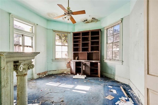 misc room featuring ceiling fan and a healthy amount of sunlight