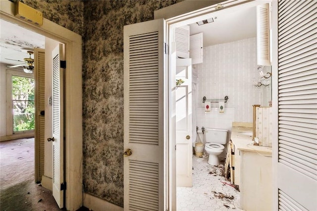 bathroom featuring tile patterned flooring and toilet