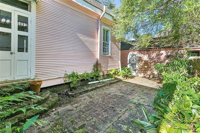 view of home's exterior with a patio