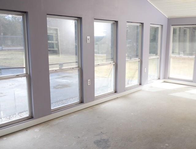 entryway featuring vaulted ceiling