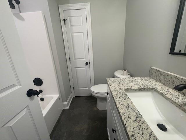 full bathroom featuring vanity, shower / bathtub combination, and toilet