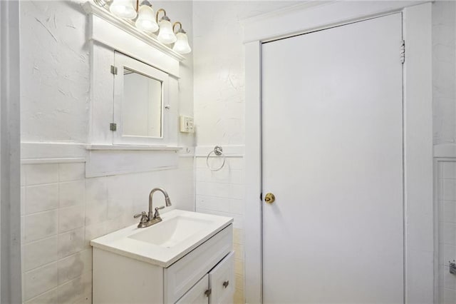 50507 Passera Ct, New Orleans, LA 70119 - bathroom featuring tile walls and vanity