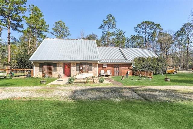 exterior space featuring a front lawn