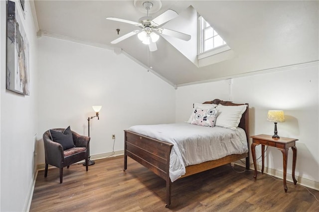 bedroom with ceiling fan, dark hardwood / wood-style flooring, lofted ceiling, and ornamental molding