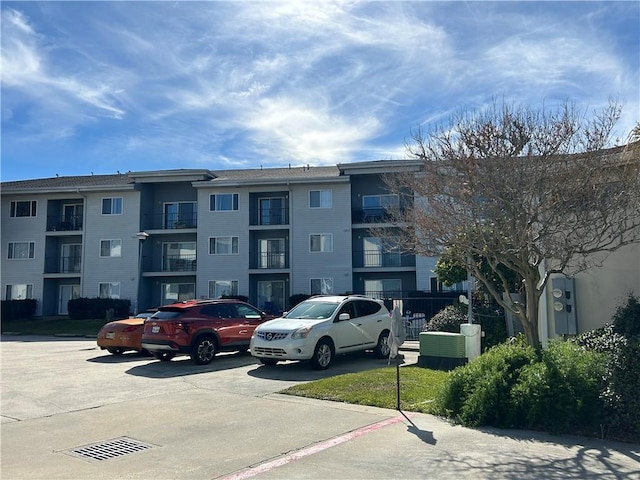 view of building exterior featuring central AC unit