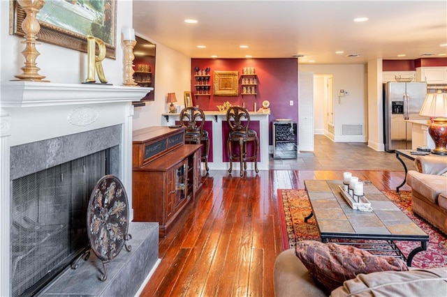 living room with dark wood-type flooring